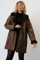 Damen Christ Winter Lammfellmantel aus Curlylamm braun mit Kapuze federleicht