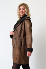 Damen Christ Winter Lammfellmantel aus Curlylamm braun mit Kapuze federleicht