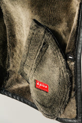 Klassische Herren Winter Lammfelljacke in schwarz nappiert zum knöpfen schließbar