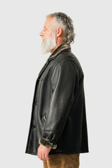Klassische Herren Winter Lammfelljacke in schwarz nappiert zum knöpfen schließbar