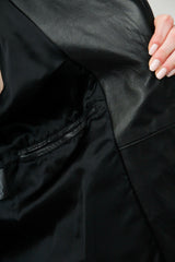 Schwarze längere sportliche Damen Gürteljacke aus Lammnappa und asymmetrischen Reißverschluss