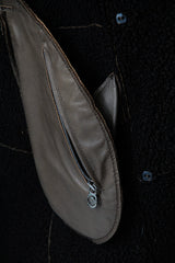 Damen Christ Winter Lammfellmantel aus Curlylamm braun mit Kapuze federleicht