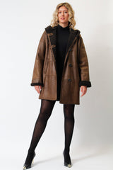 Damen Christ Winter Lammfellmantel aus Curlylamm braun mit Kapuze federleicht