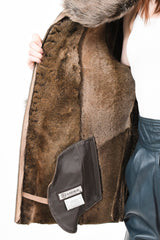 Halblange Damen Lammfelljacke aus Merinolammfell mit Toskanaverbrämmung in Taupe
