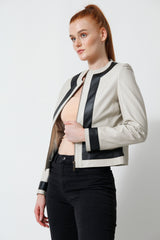 Damen Bolero in Ziegennappa ivory mit Kontrast schwarz perforiert